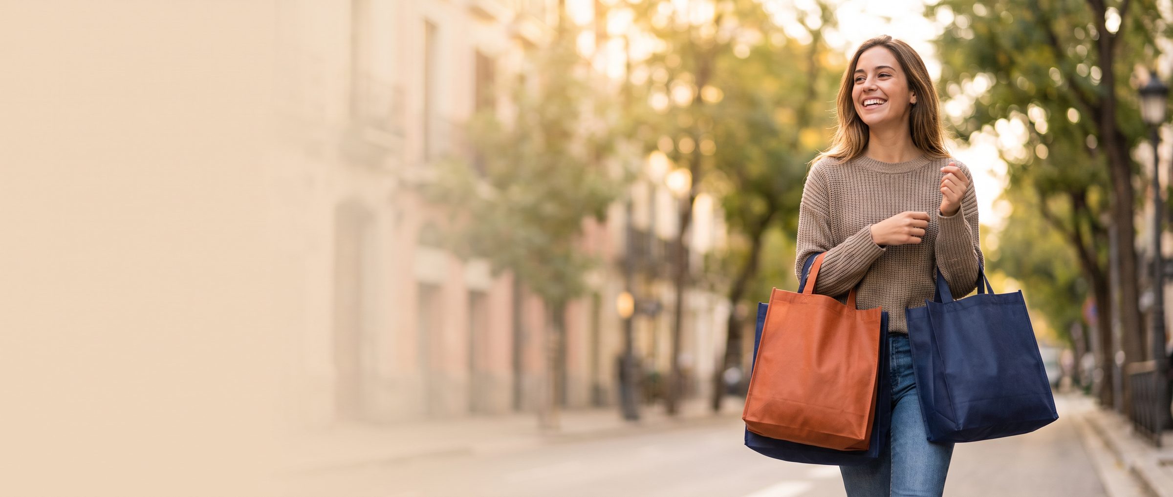 Smiling woman carrying shopping bags
